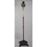 A Victorian Cast Iron and Brass Oil Lamp Stand with Copper Oil Lamp, 141cm high