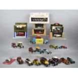 A Collection of Boxed Diecast Toys to include Gold State Coach, Vintage Racing Cars, Buses and