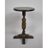 A Mid 20th Century Circular Oak Wine Table with Carved Vase Support, 30cm Diameter