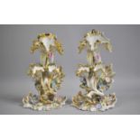 A Pair of Continental Glazed Porcelain Floral Decorated Vases with Gilt Highlights, 28cm high,