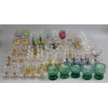 A Large Collection of Various Coloured Drinking Glasses, to Include Part Hock Sets etc