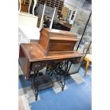 A Vintage Oak Cased Jones Treadle Sewing Machine