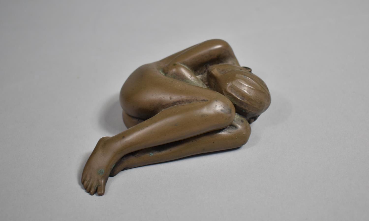 A Bronzed Study of a Curled Up Sleeping Figure, Signed D J Scadwell