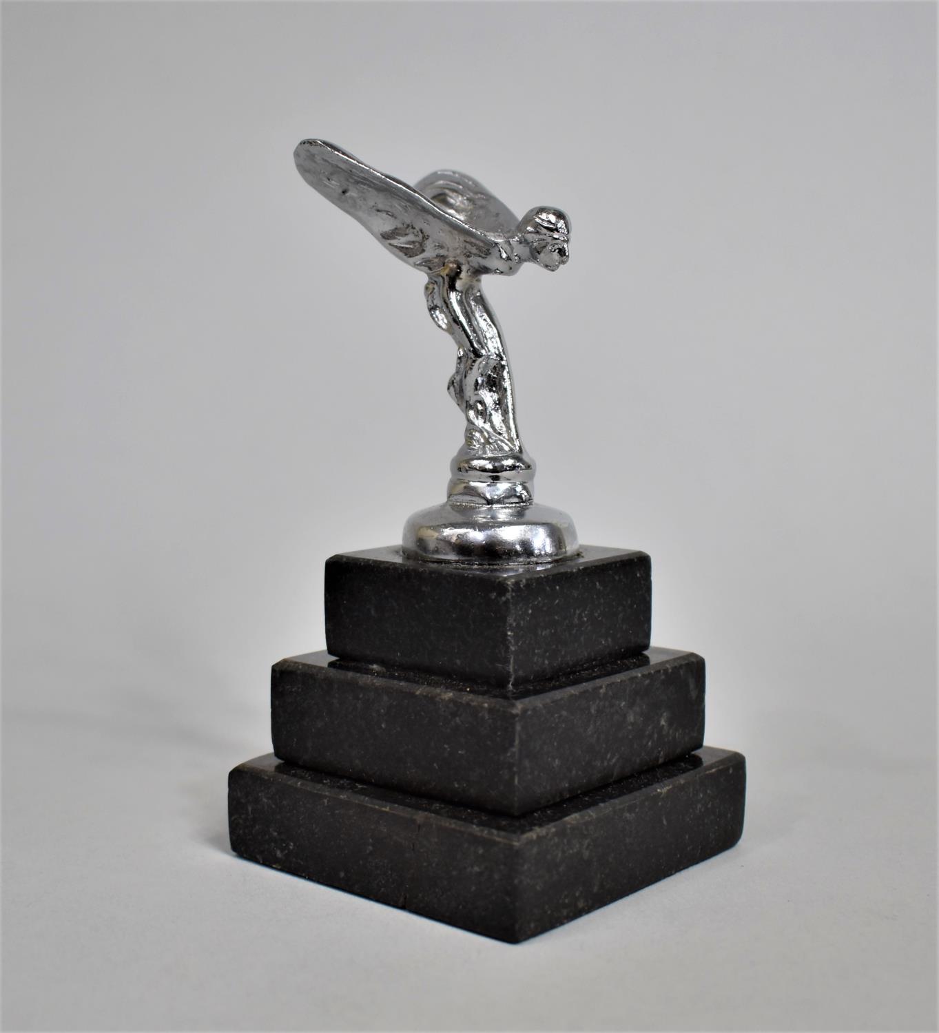 A Small Model of The Spirit of Ecstasy on Stepped Plinth, Overall Height 12cms