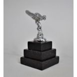 A Small Model of The Spirit of Ecstasy on Stepped Plinth, Overall Height 12cms