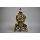 A Continental Brass Louis XVI Style Clock with Porcelain Roman Numerals, 41cm high