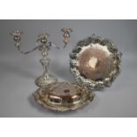 A Collection of Silver Plate to Comprise Three Branch Candelabra, Lidded Oval Entree Dish and a