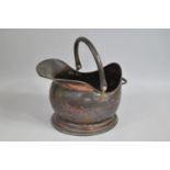 A Vintage Hammered Copper Helmet Shaped Coal Scuttle, 35cm High