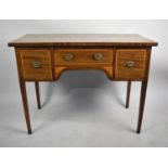 An Inlaid Mahogany Writing Desk with Long Centre Drawer Flanked by Deeper Drawers Either Side on
