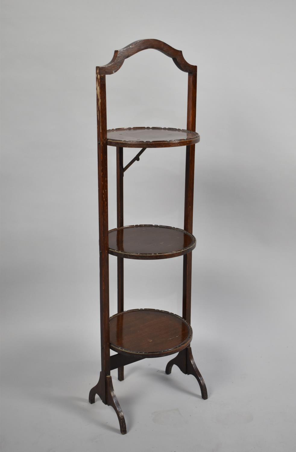 An Edwardian Mahogany Three Tier Cake Stand