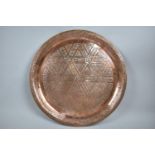 An Islamic Copper Charger, Makers Stamp Verso, 34.5cm Diameter