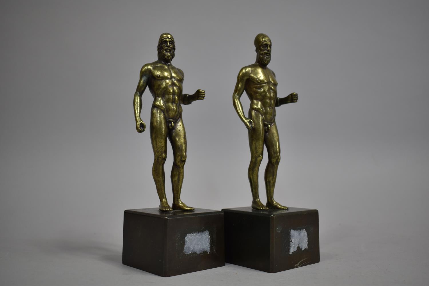 A Pair of Continental, Probably Greek Bronze Sculptures of Warriors on Rectangular Plinth Bases,
