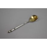 A Russian Silver Coffee Spoon with Gilded Bowl, Stamped 84/875 AL