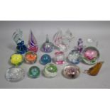 A Collection of Various Paperweights