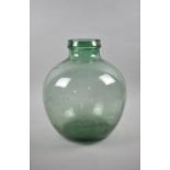 A Vintage Green Glass Carboy, 36cm high