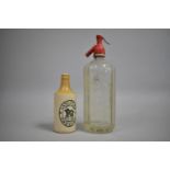 A Vintage Moorhouse Brother Soda Syphon and a Stoneware Bottle for Laycock's of Chester