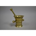 A Small but Heavy Brass Pestle and Mortar, 9.5cm Diameter and 9.5cm high