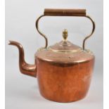 A Large Copper Kettle with Brass Acorn Finial, 30cm high