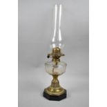 A Late Victorian Brass Based Oil Lamp with Octagonal Plinth Base and Glass Reservoir, Complete