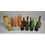 A Collection of Various Collectors Glass Bottles and Stoneware examples