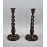 A Pair of Edwardian Open Spiral Oak Candlesticks, 31cm high