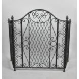 A Modern Wrought Iron Three Division Fire Guard, 70cm high