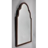 A Mahogany Framed Arch Top Wall Mirror, 64x38cm Overall