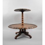 An Edwardian Oak Two Tier Lazy Susan with Bobbin Support, 43cm high