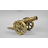 A Heavy Brass Model of an 1812 Cannon, 28cm Long