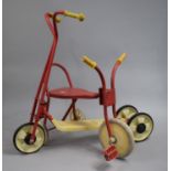 A Vintage Child's Scooter and Tricycle