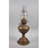 A Late Victorian/Edwardian Brass Oil Lamp with Chimney