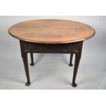 An Oak Oval Topped Occasional Table with Carved Panels, 108cm Wide