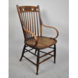 A Vintage Spindle Back Scroll Arm Chair