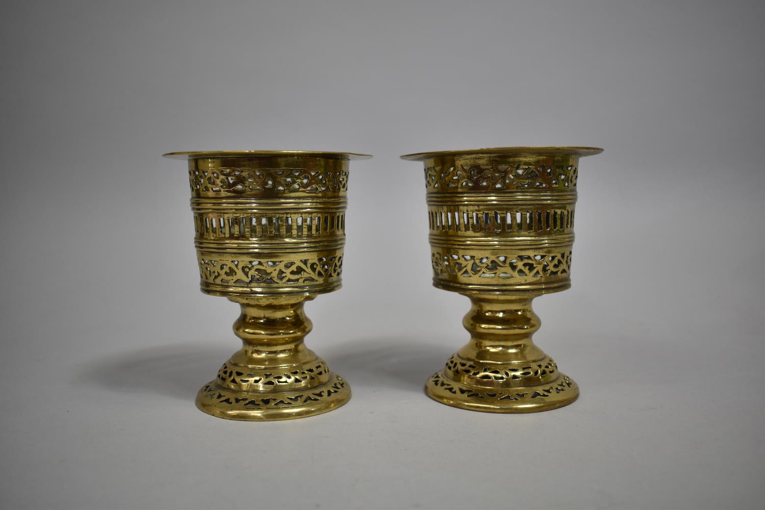 A Pair of Late 19th/ Early 20th Century Brass Pierced Circular Stands on Stepped Bases, 11cm