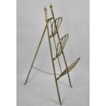 A Brass Three Tier Country House Newspaper Stand with Hinged Easel Tripod Support, 100cm high