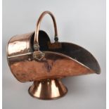 A Late 19th Century Copper Helmet Shaped Coal Scuttle