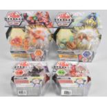 A Collection of Four Bakugan Armoured Alliance Figures in Original Blister Packs