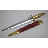 An Indian Dagger with Brass Caged Ball Handle, Complete with Brass Mounted Velvet Covered