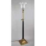A Late Victorian/Edwardian Brass Rise and Fall Table Lamp with Tapering Ribbed Column Support and