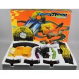 A Micro Mania Scalextric Set with Four Cars