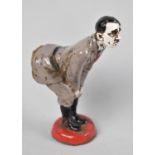 A Novelty Enamelled Metal Pin Cushion in the form of Adolf Hitler Bending Forwards, 12cm high