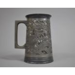 A Pierced Pewter and Glass Tankard, Made in Hong Kong, Winging, Decorated with Dragons, 14cm high