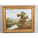 A Gilt Framed Oil On Canvas Depicting Wooded Pond with Hills in Background, Signed S Mulles, 50x40cm