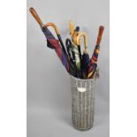 A Cylindrical Stick Stand with Label Inscribed "Shabby Chic" Containing Various Walking Sticks and