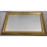 A Modern Rectangular Gilt Framed wall Mirror, 90 by 60cms