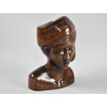 An Indonesian Carved Wooden Bust, 28cms High
