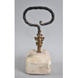 A Novelty Wrought Iron Door Porter with Alabaster base and Gilt Metal Leaf Decoration, 28cms High