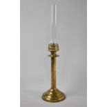 A Late Victorian Brass Candleholder with Chimney, Overall Height 39cms
