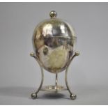 An Edwardian Silver Plated Ovoid Egg Warmer, Missing Inner Fitting and Burner, Tripod Support, 22cms