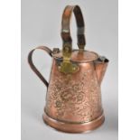 An Unusual Copper and Brass Water Carrier with Hinged Lid and Spout, Repoussé Work Floriate
